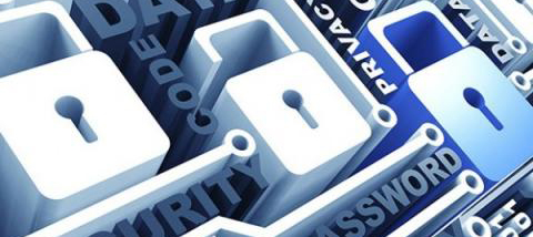 Stock photo of stylized padlock icons surrounded by a word cloud of information security terms.